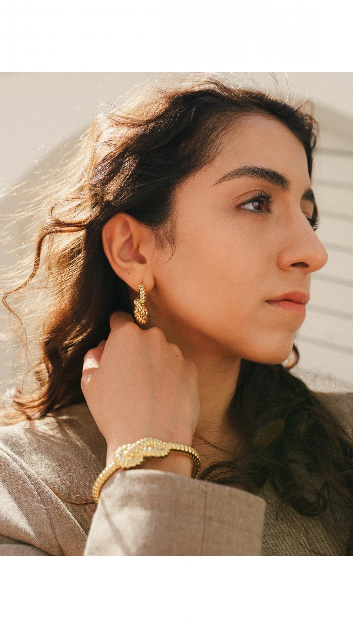 Editorial — hands crossed — Esther Omaraee