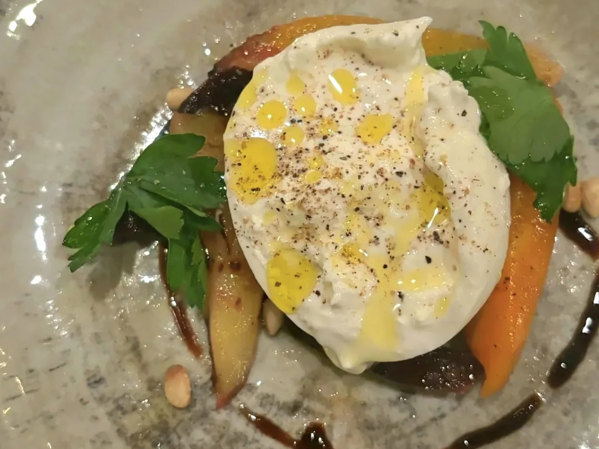 A burrata dish served for dinner in Christianshavn, Copenhagen