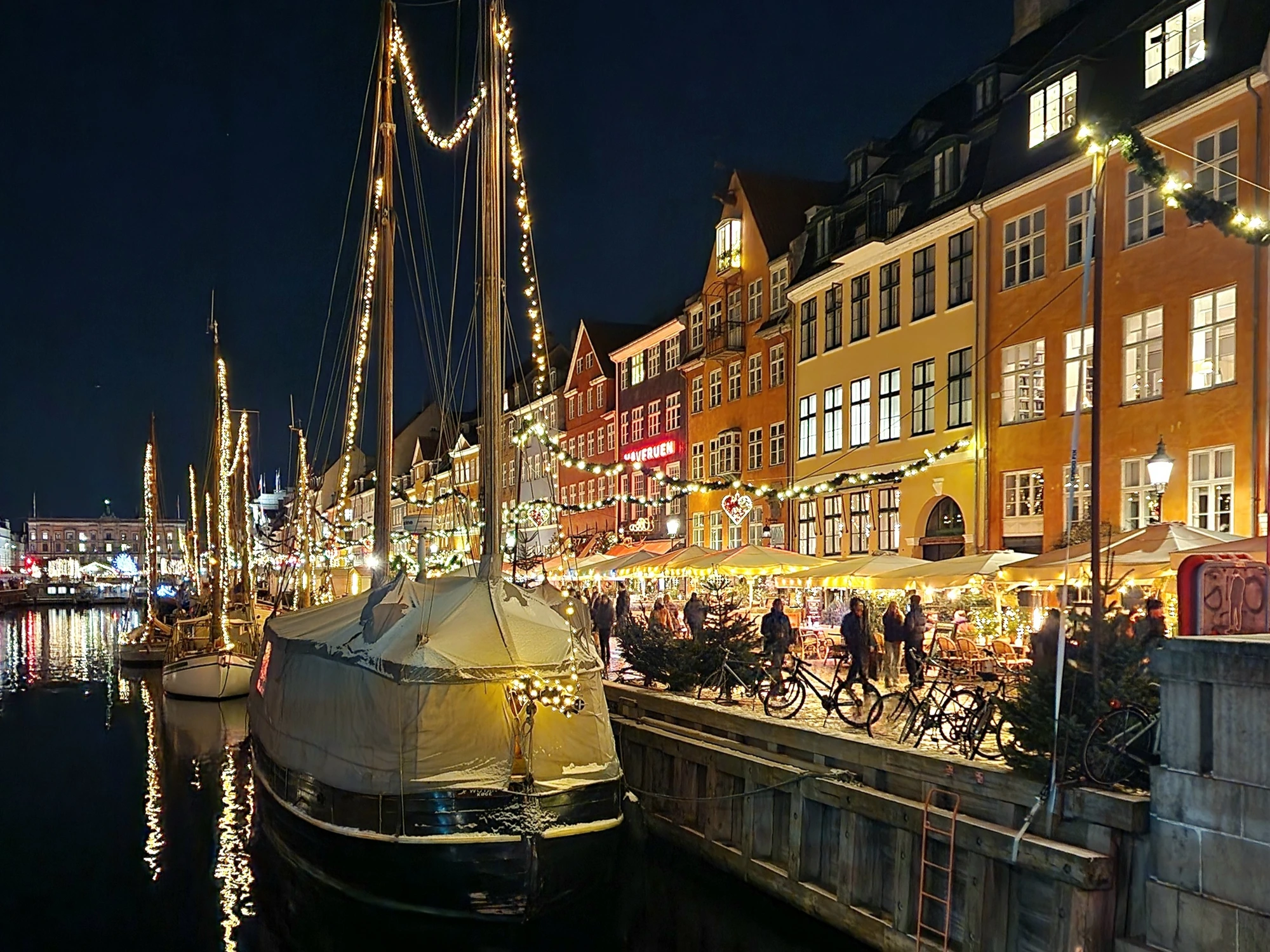 The candle-lit Lucia kayak flotilla on the Copenhagen canals in December