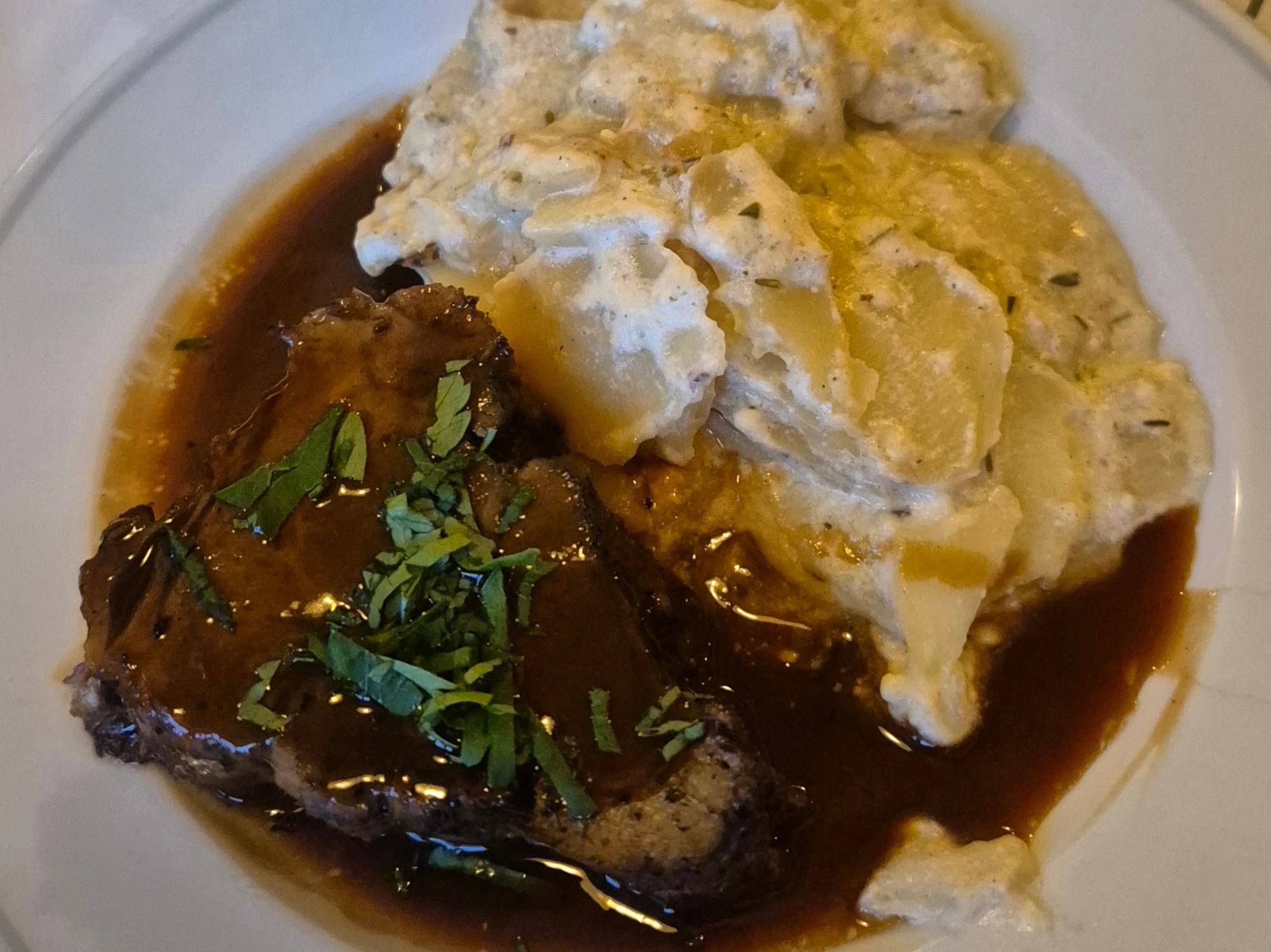 A fair-priced Copenhagen restaurant dish — steak in gravy with creamy potatoes