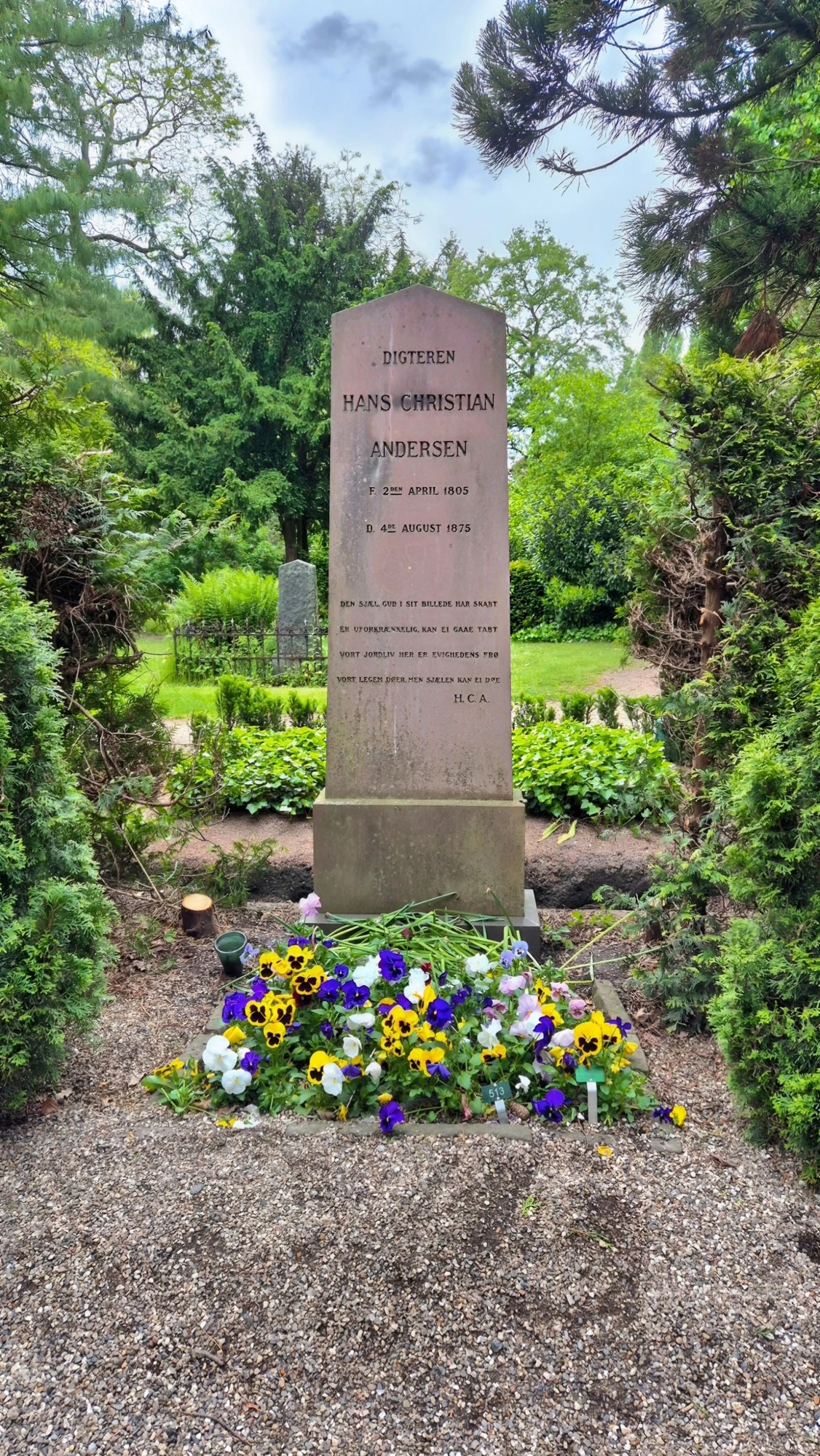 H.C. Andersen's gravestone at Assistens Cemetery with fresh flowers