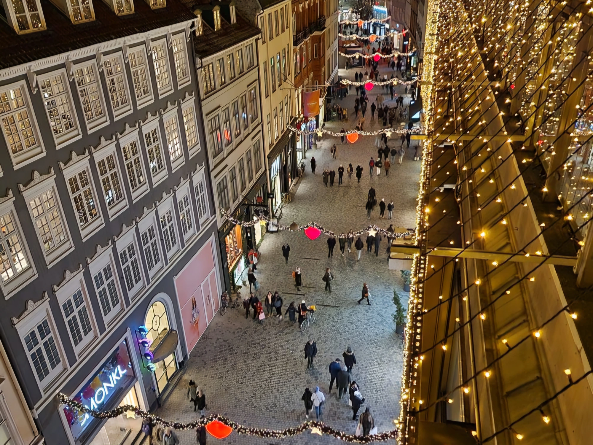 Christmas garlands and hearts over the cobbled shopping streets