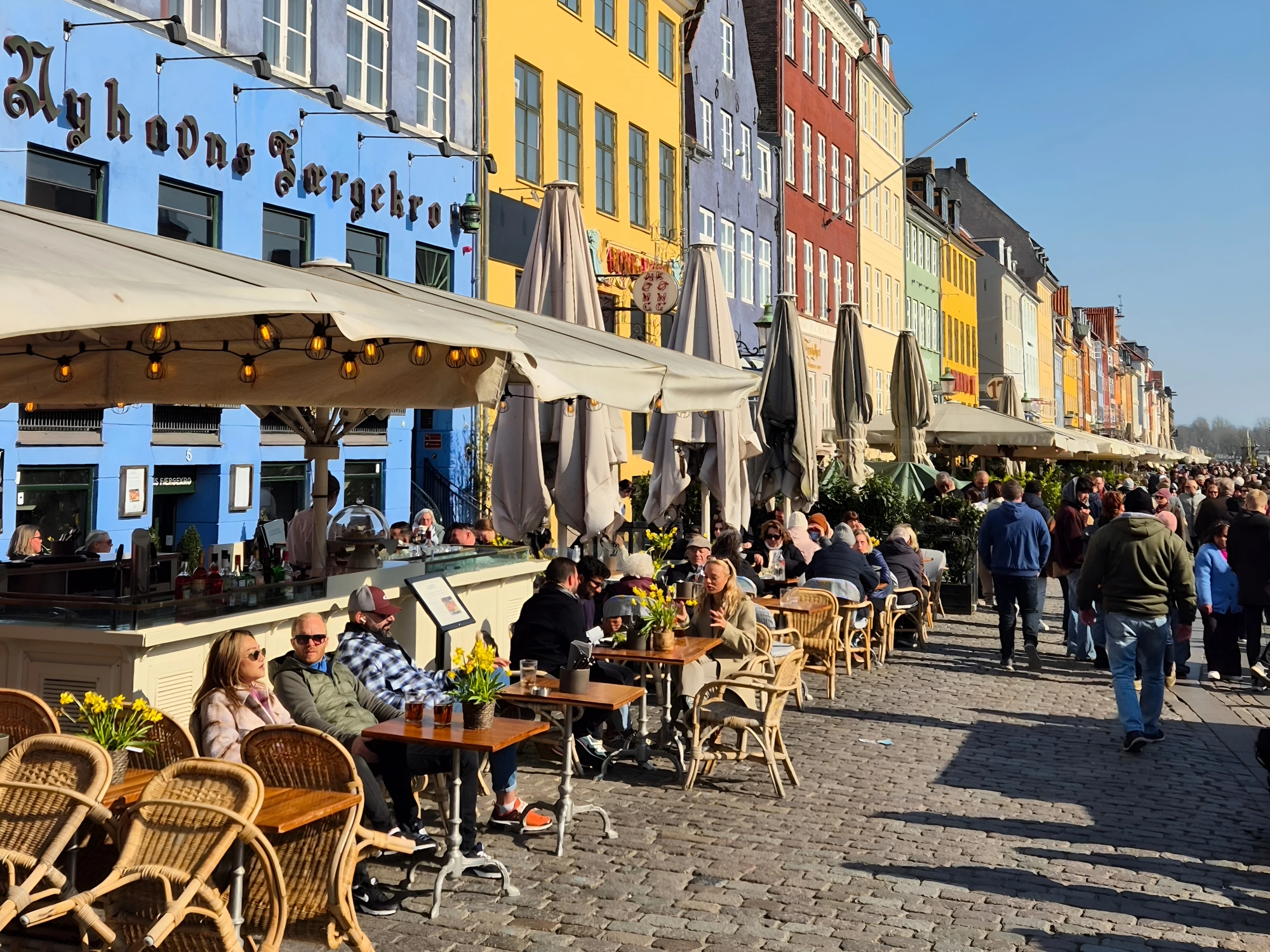 The first terrace coffees of the year on Nyhavn's sunny side in March