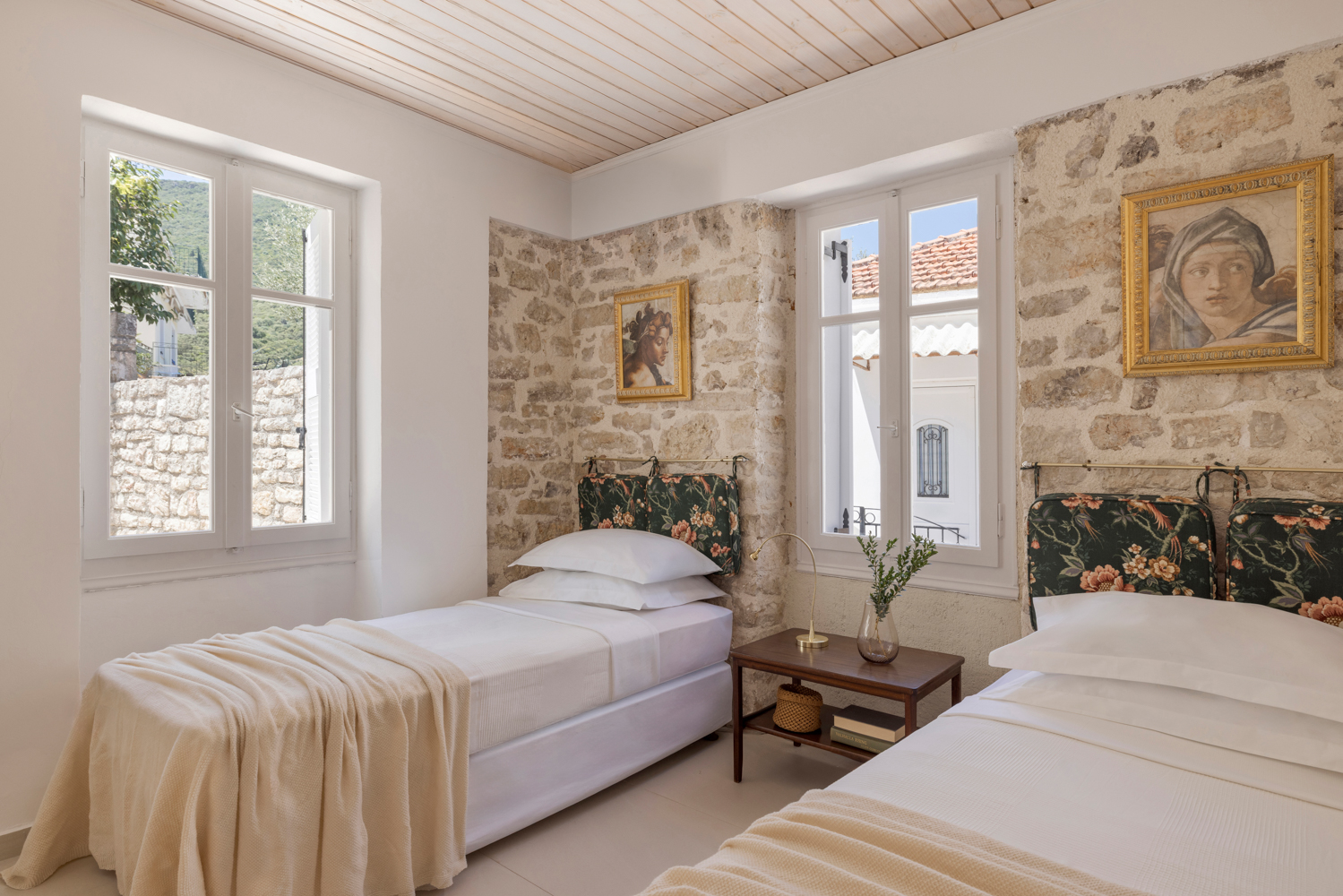 Second bedroom wide view — twin beds, garden windows, hand-planed wood ceiling