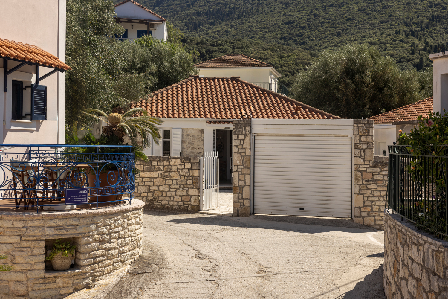 Approach to the villa through the olive-covered hills of Kioni