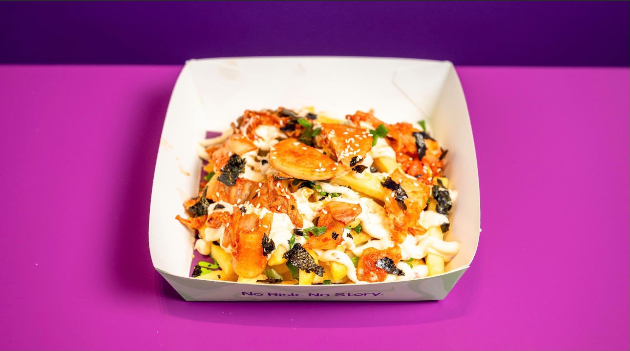 Kimchi fries loaded with kimchi, nori, green onion and house sauce