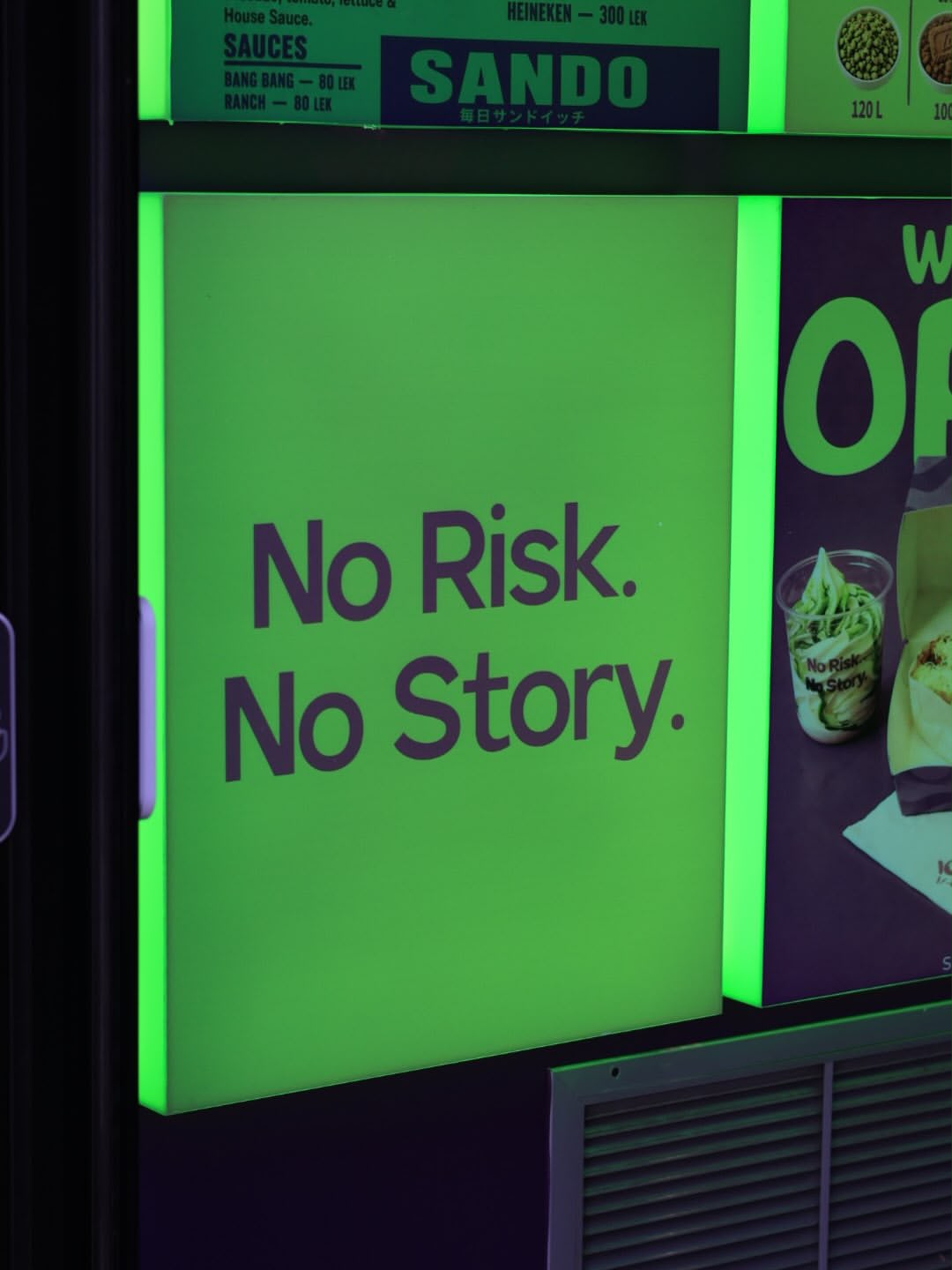 Pinkoi menu board with an illuminated No Risk. No Story. panel